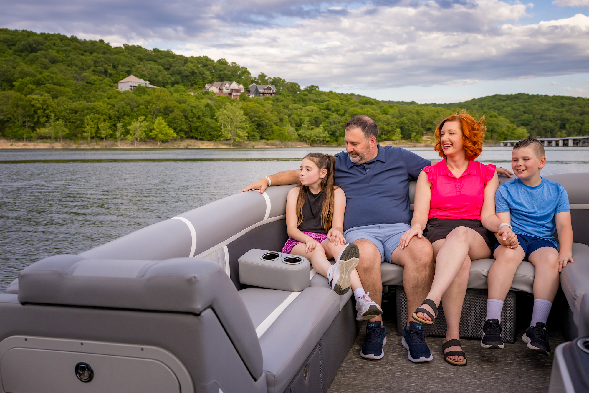A family aboard a resort rental boat on Table Rock Lake