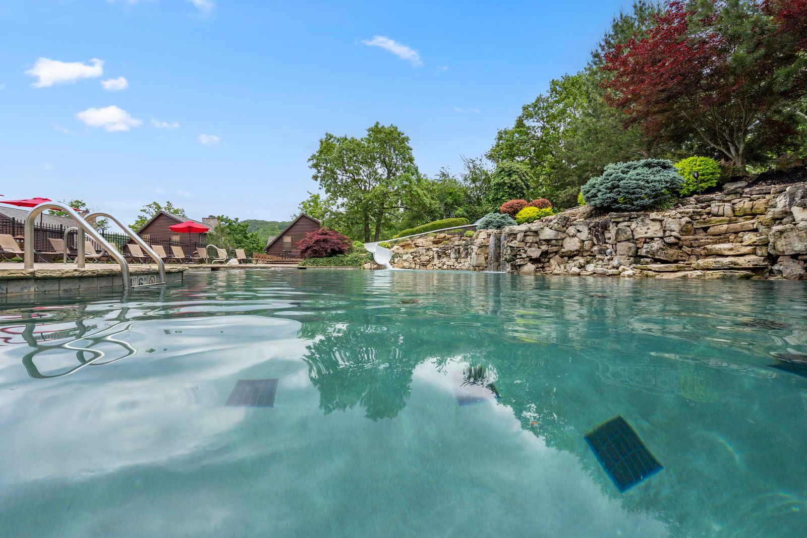 The grotto-style pool and water slide at Chalets on Table Rock Lake
